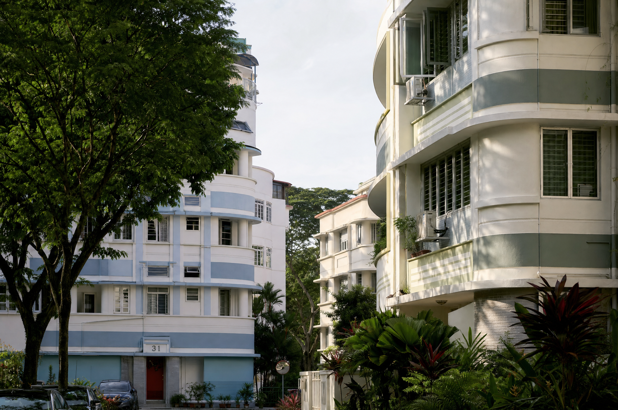 Art Deco curved apartment facade in Tiong Bahru with morning light